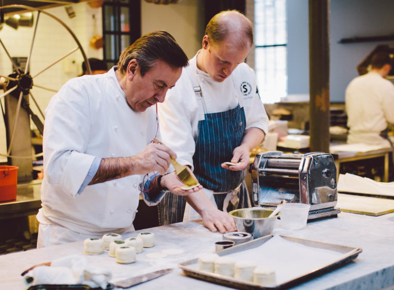 Chef Daniel Boulud in the kitchen at Spoon and Stable.