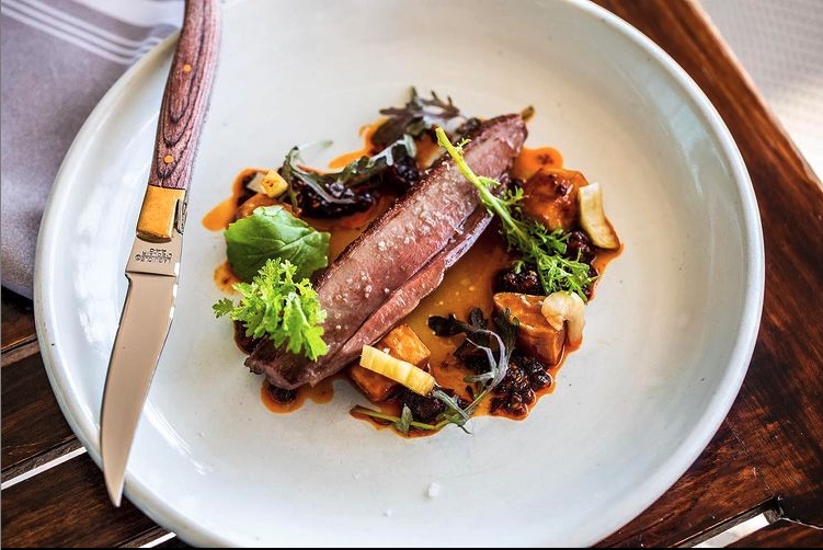 Duck breast with nixtamalized sweet potatoes, field pea salsa macha and fermented bok choy stems