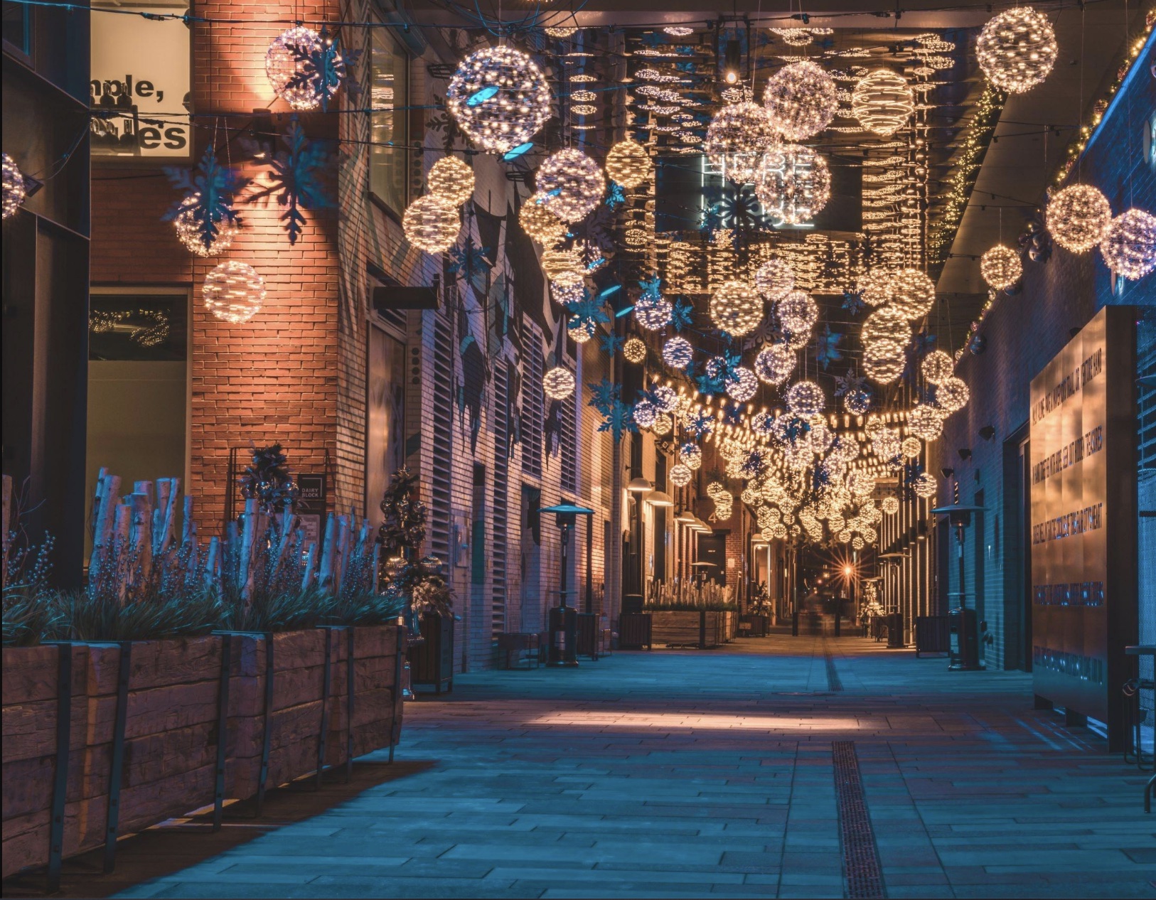 Cover Image for Image of holiday lights in an alleyway in front of Blanchard Family Wines