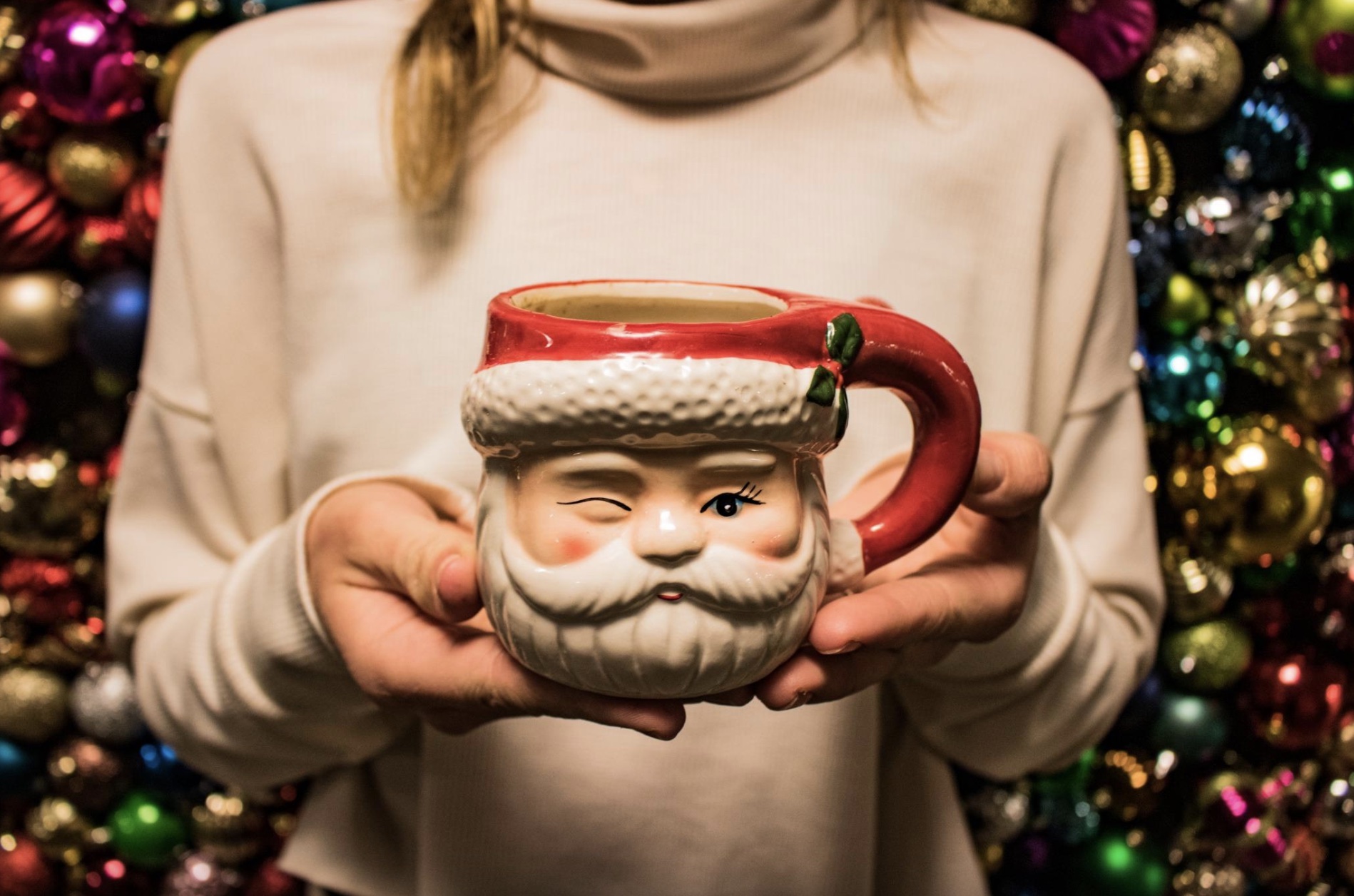 Cover Image for Image of a woman holding a santa mug