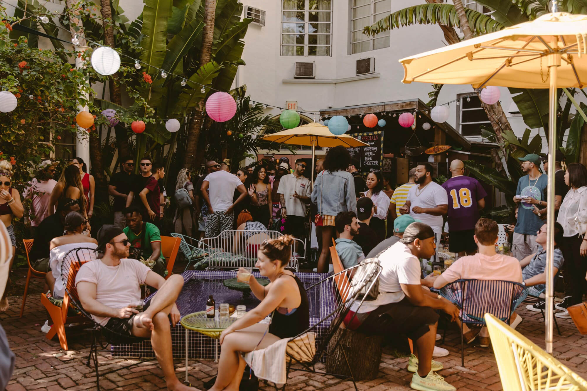 Cover Image for Broken Shaker Patio packed with people in Miami