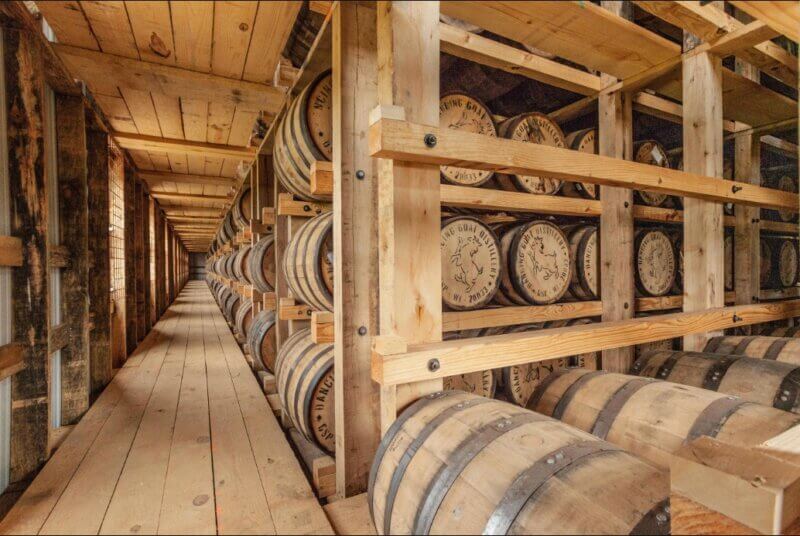 Barrel/aging room filled with barrels from Dancing Goat Distillery