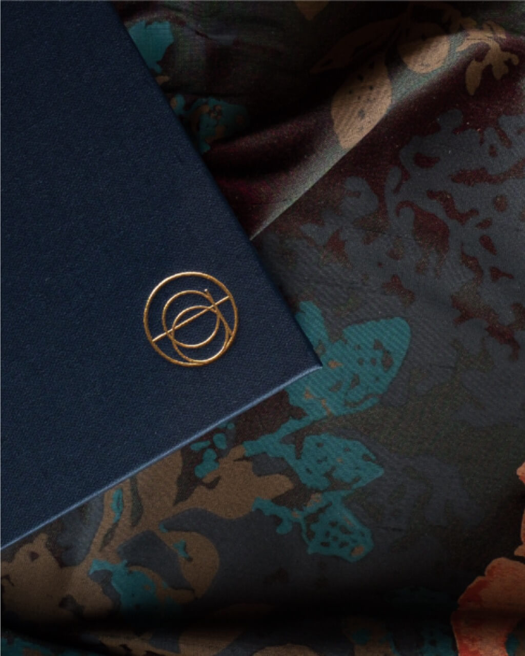Atomix menu on intricate embroidered fabric