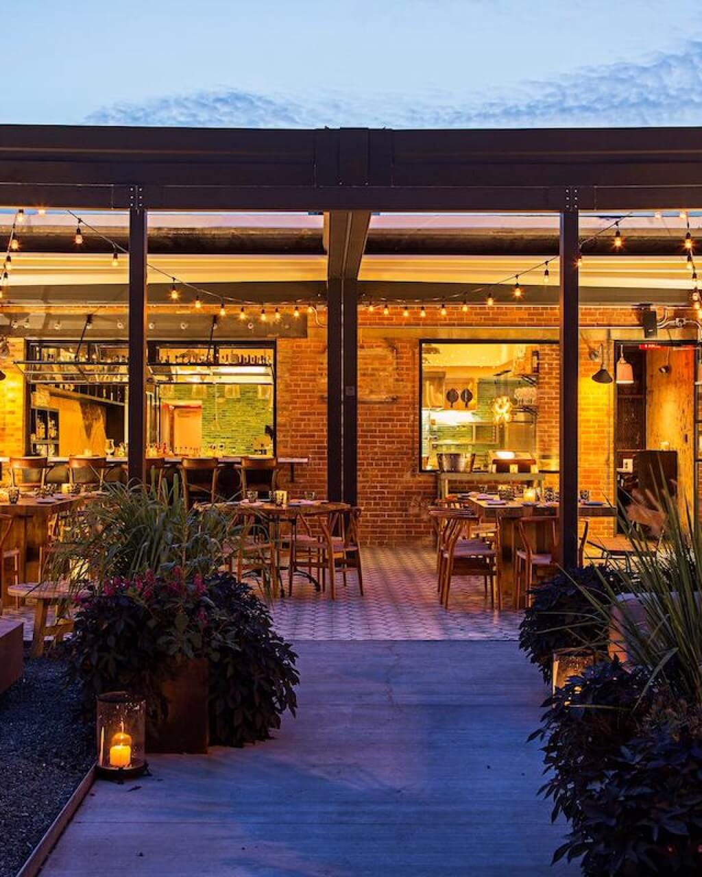 Exterior patio with string lights at Masseria