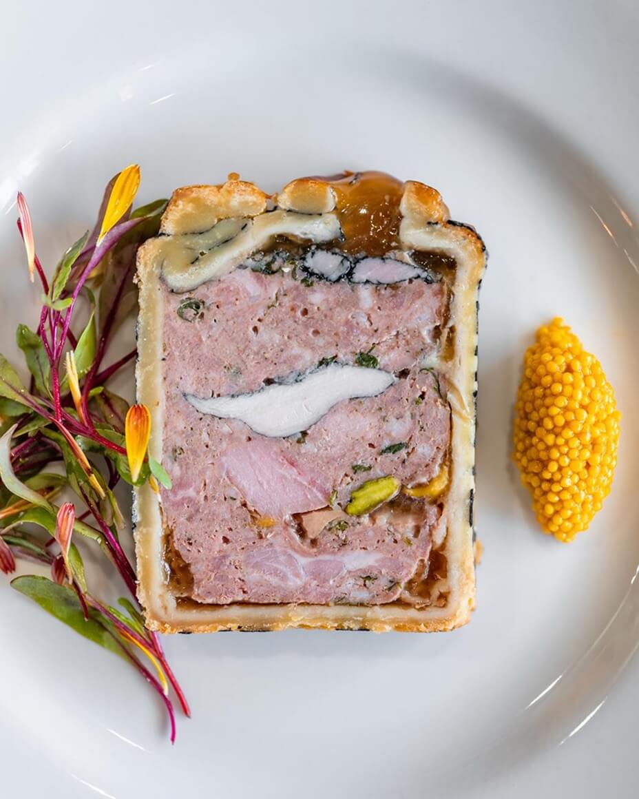 Pâté en croûte with fresh herbs and quenelle of mustard seed