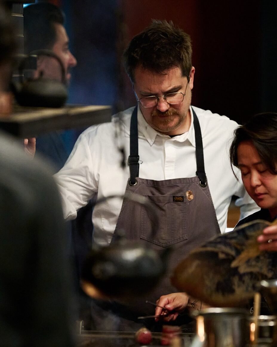 Marc Zimmerman and Peggy Tan cooking