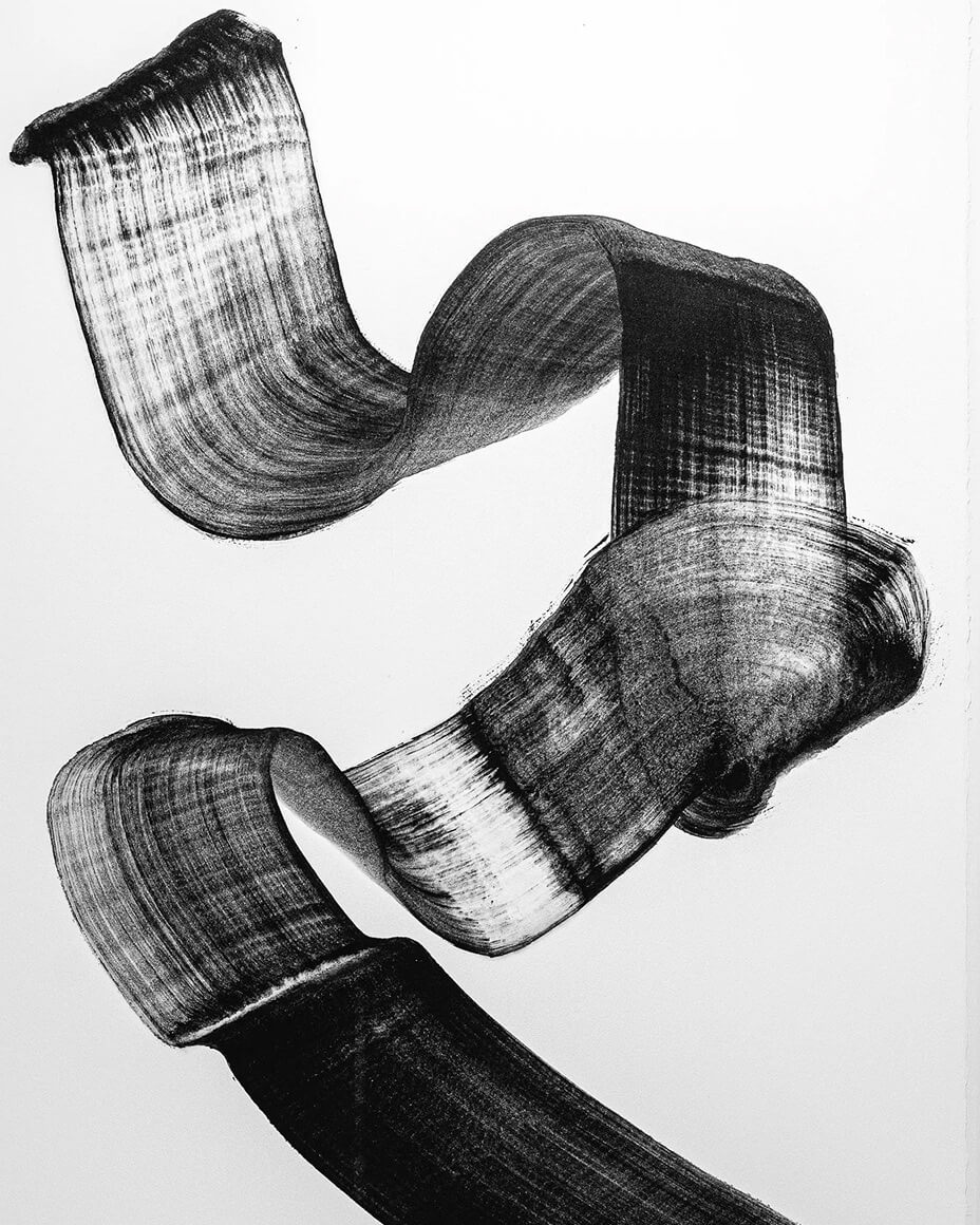 Painting with a single black brush stroke in a ribbon pattern on a stark white background
