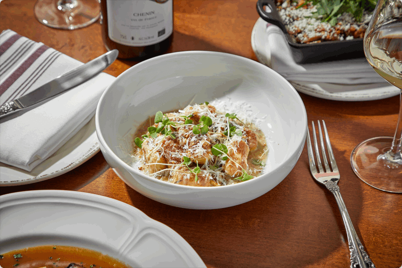 Photo focusing on plated dish at Dear Margaret